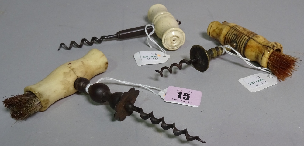 Three mid-19th century straight pull corkscrews, each with turned bone handle,