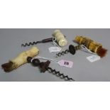 Three mid-19th century straight pull corkscrews, each with turned bone handle,