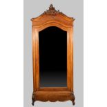 A late 19th century French walnut and kingwood armoire,