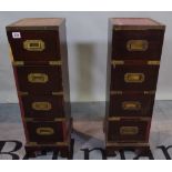 A pair of campaign style brass bound hardwood four drawer pedestals, 22cm wide x 69cm high, (2).