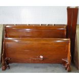 Simon Horn 1996; a 20th century walnut king size sleigh bed, 188cm wide x 125cm high.