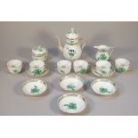 A Herend porcelain near six piece coffee service decorated in the green 'Chinese Bouquet' pattern,