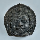 A Nepalese bronze mask of Bhairava, 19th century,