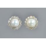 A pair of gold, diamond and cultured pearl cluster earstuds,