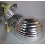 A 20th century cream painted heat lamp converted to a table lamp and a ribbed metal ceiling light