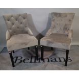 A set of eight modern grey velvet upholstered dining chairs on ebonised tapering supports,