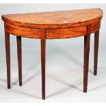 A George III kingwood and boxwood strung mahogany semi elliptic card table on tapering square