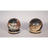 Two 19th century marble spheres, each on a marble dished stand, spheres 10cm diameter, (4).