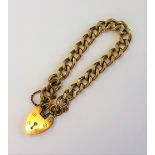 A 9ct gold faceted curb link bracelet, on a 9ct gold heart shaped padlock clasp, weight 28.8 gms.