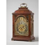 A George I giltmetal-mounted walnut striking quarter repeating table clock By Charles Goode, London,