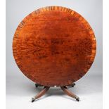 A George III coromandel banded mahogany centre table,