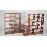 A pair of Chinese hardwood shelves, late 19th/early 20th century, 51cm high by 50cm at widest point,