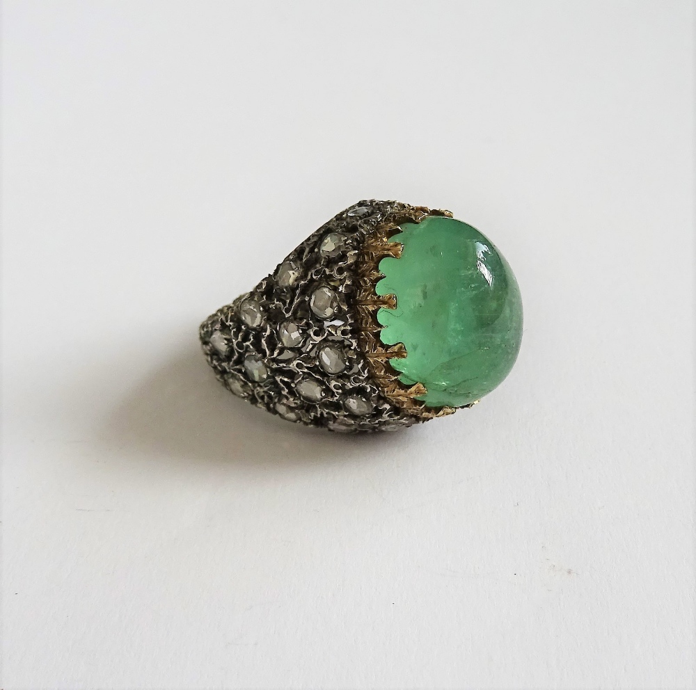 An emerald and diamond dress ring by Buccalleti,