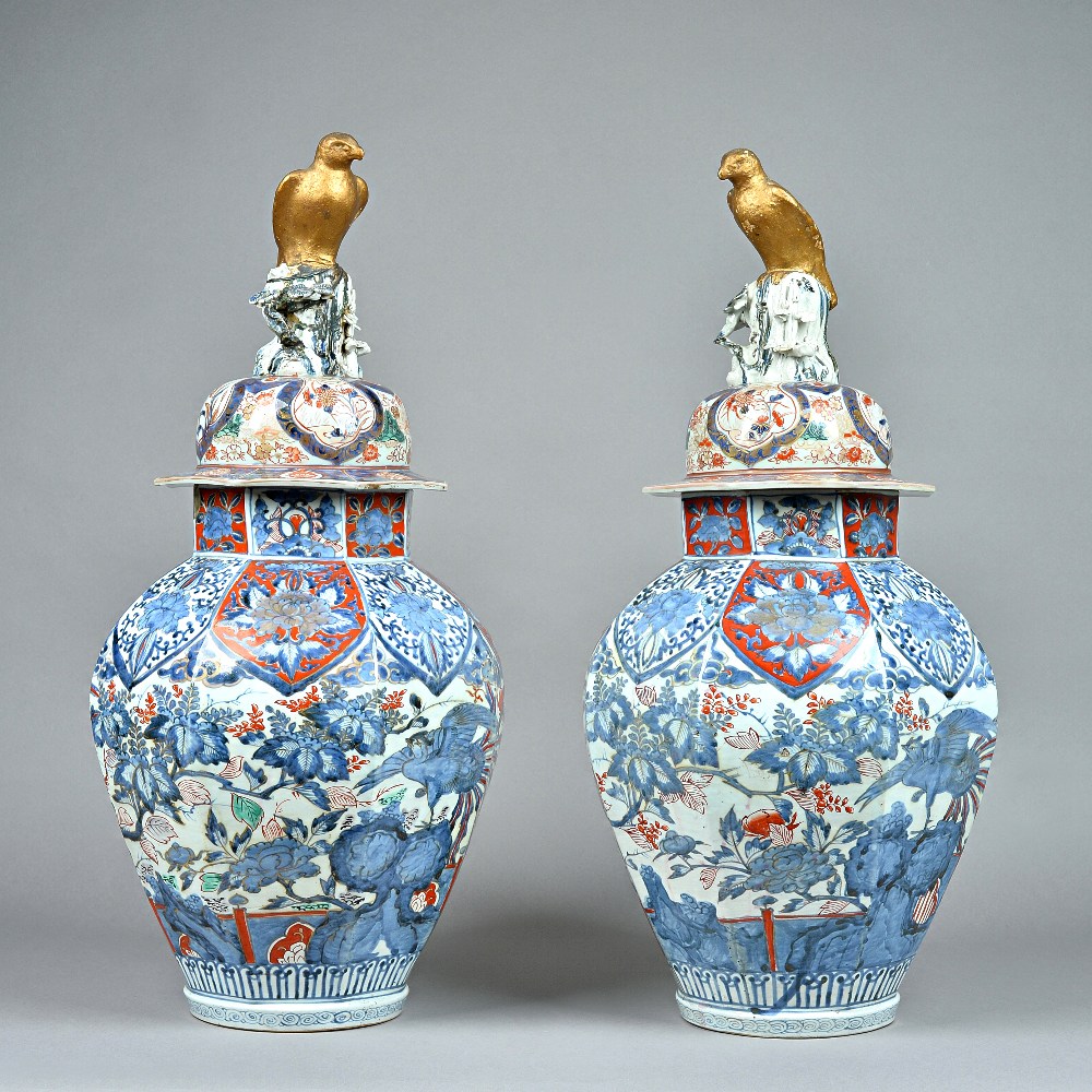 A large pair of Japanese Arita octagonal vases and covers, Edo period, circa 1700,