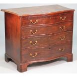 A George III mahogany serpentine dressing chest of four long graduated drawers, on bracket feet,