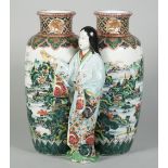 A Japanese ao-kutani double vase, Meiji period, the conjoined vases painted with river landscapes,