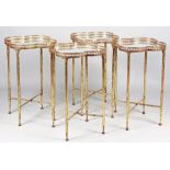 A set of four gilt-metal occasional tables,