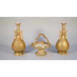 A pair of Royal Worcester two-handled vases, circa 1900, of Persian inspiration,