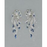 A pair of white precious metal, sapphire and diamond set pendant earclips,