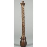 A Chinese rhinoceros horn fly whisk handle, 19th century, carved with bamboo, pine and prunus, 21cm.