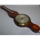 An Edwardian inlaid mahogany barometer, 25cm wide x 96cm high.