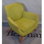 A 20th century hardwood framed tub chair with green upholstery on tapering supports,