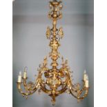 An ormolu six branch chandelier, Louis XVI style, foliate cast form, 116cm high.