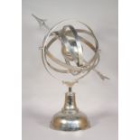 A modern white metal armillary sphere, on a domed stand, 65cm high.