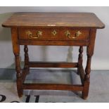 A late 18th century style oak single drawer side table.