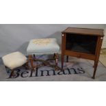 A 19th century continental mahogany 'X' frame footstool 42cm wide x 43cm high,
