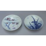 Two small Nabeshima dishes, Meiji period, each with a blue combed foot,