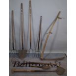 A quantity of 19th century and later farming tools, spades, pitchforks and sundry, (qty).
