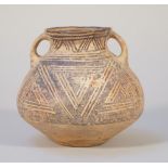 A small Chinese red earthenware two-handled vase, Neolithic period, circa 3rd century BC,