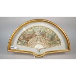 A French painted paper fan, late 18th century, detailed with Gallant companion against a landscape,