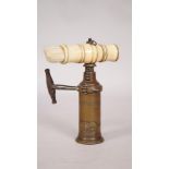 A mid-19th century Thomason type wide rack corkscrew, with turned bone handle and brush,
