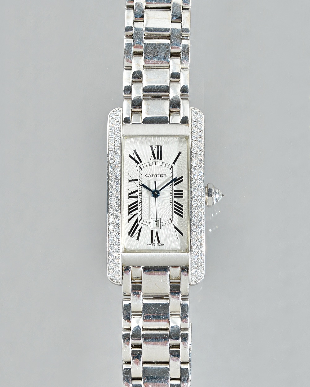 Cartier; a diamond set 18ct white gold Tank Americaine wristwatch, model number 1726,