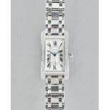 Cartier; a diamond set 18ct white gold Tank Americaine wristwatch, model number 1726,