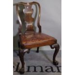 A late Victorian mahogany dining chair with Queen Anne style vase back on ball and claw supports,