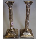 A pair of Regency style silver plated candlesticks, 31cm high (2).