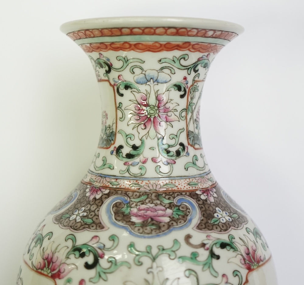 A pair of Chinese famille-rose slender baluster vases, circa 1900, - Image 9 of 16