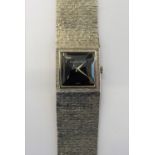 A Bueche-Girod 9ct white gold bracelet wristwatch, the signed square black dial,
