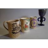 Ceramics, comprising; two 19th century Staffordshire tankards, 12cm high,