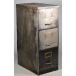 Industrial Design; a polished steel and brass three drawer filing cabinet, 39cm wide x 102cm high.