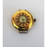 An 18ct gold cased half hunting cased wristwatch, the three quater plate jewelled movement,