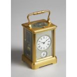 A French gilt brass cased carriage clock Late 19th century In a Corniche case,