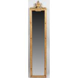 A 19th century gilt framed pier mirror with urn crest over moulded frame, 33cm wide x 157cm high.