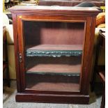 A 19th century mahogany single door display cabinet on plinth base, 83cm wide x 103cm high.