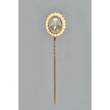 A Victorian gold and half pearl set presentation stick pin,