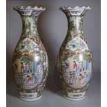 A pair of Chinese Canton style baluster vases, 62cm high.
