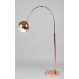 A 1970s style adjustable copper coloured floor light,
